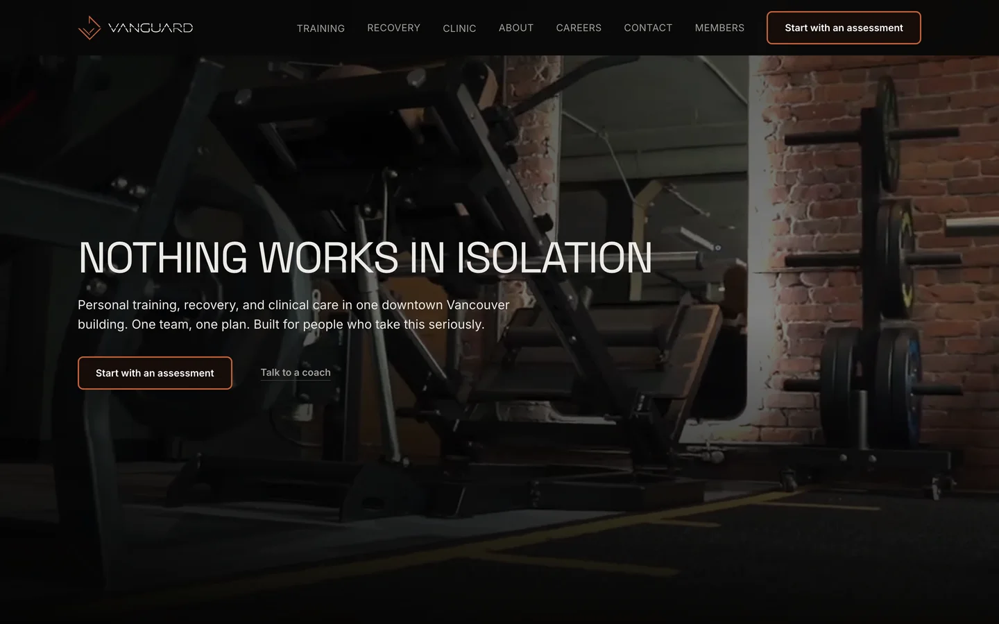 Vanguard Performance home page on desktop: dark hero over gym equipment with the headline "Nothing works in isolation" and a Start with an assessment button